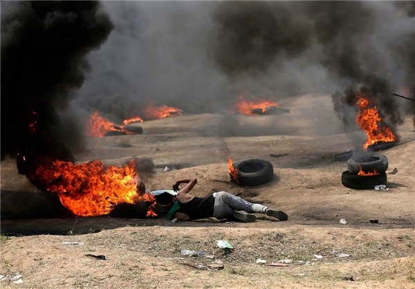 تیراندازی گسترده نظامیان صهیونیست؛ ۱۸ شهید و صدها زخمی/ ساقط شدن یک پهپاد اسرائیلی + عکس